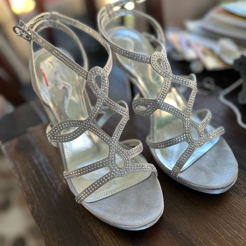 Nina brand silver shoes, worn once. Still perfect condition.
